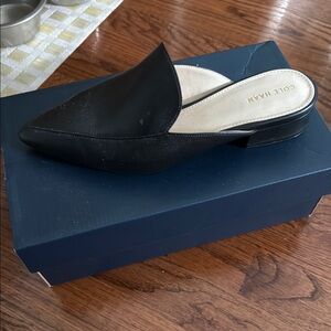 Cole Haan Black Mules Sleek Design